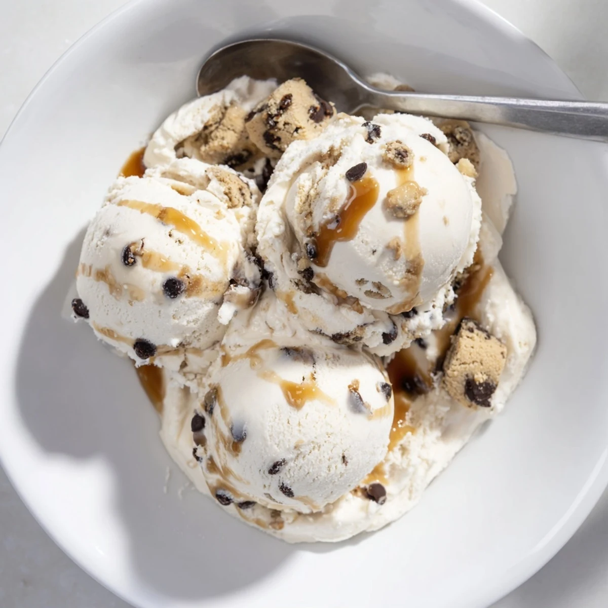 Creamy cottage cheese ice cream with cookie dough bites, a guilt-free dessert.  