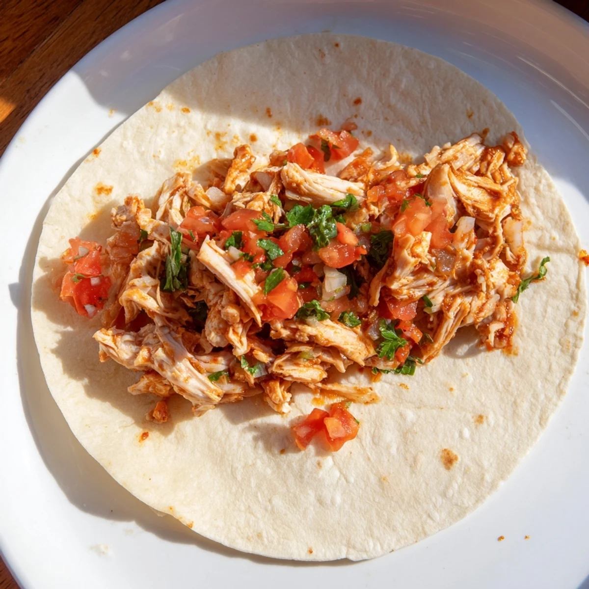 Steaming Crock-Pot shredded chicken tacos bursting with flavor, perfect for a family dinner feast.