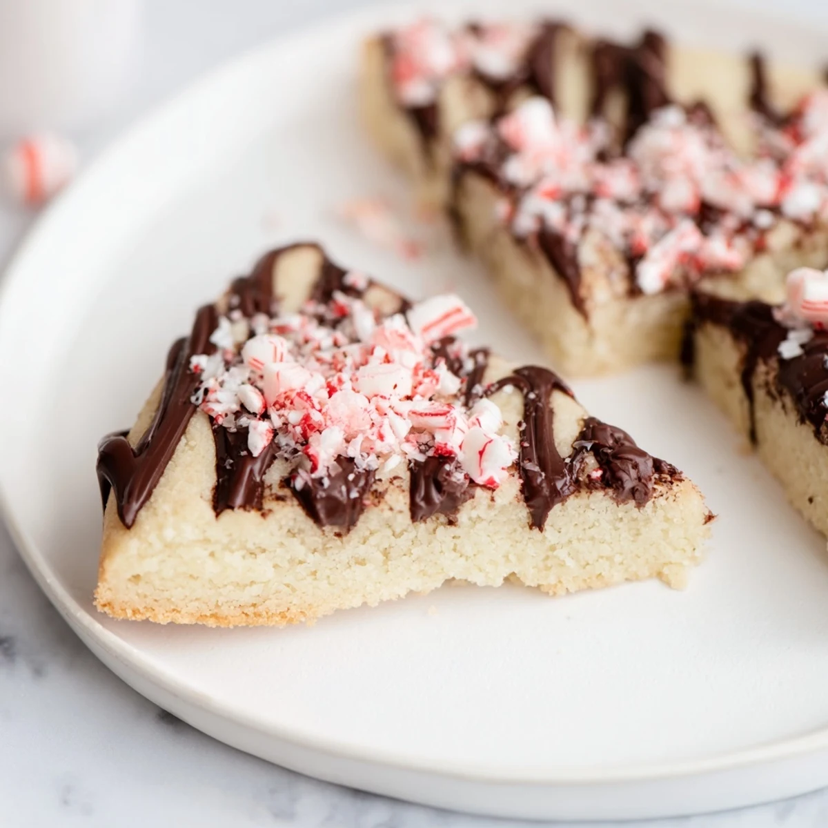 Warm, inviting image of Chocolate Peppermint Shortbread Wedges, a festive dessert ready to enjoy.