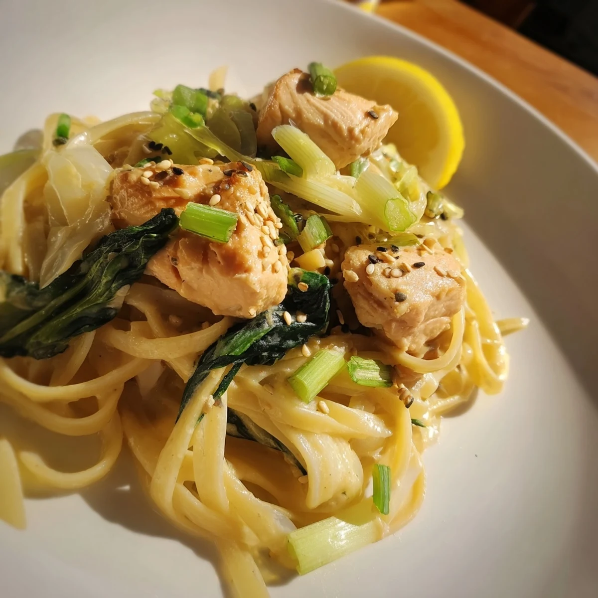 Creamy miso butter salmon pasta, with tender salmon and bok choy, ready for lunch or dinner.