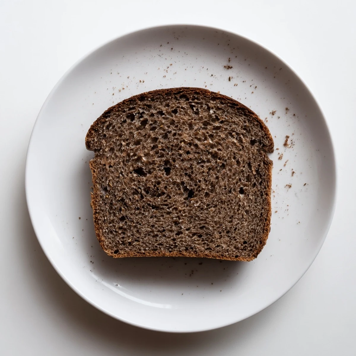The beautiful dark interior of Estonian Leib sourdough, perfect for slicing and serving with butter.