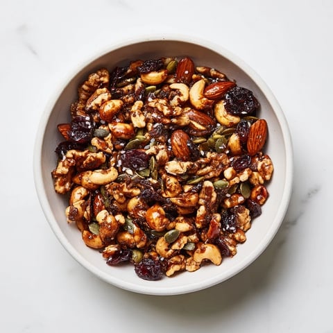 Golden roasted Squirrels Gourmet Nut Bowl, offering a delicious blend of nuts and seeds, ready to enjoy.