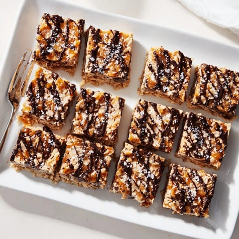 Chewy texture and sweet-salty flavors burst in these homemade 7-Layer Magic Bars for dessert tonight.
