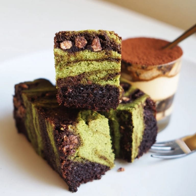 Delightful chai tiramisu mini cups, layered with spiced mascarpone and dusted with cocoa.