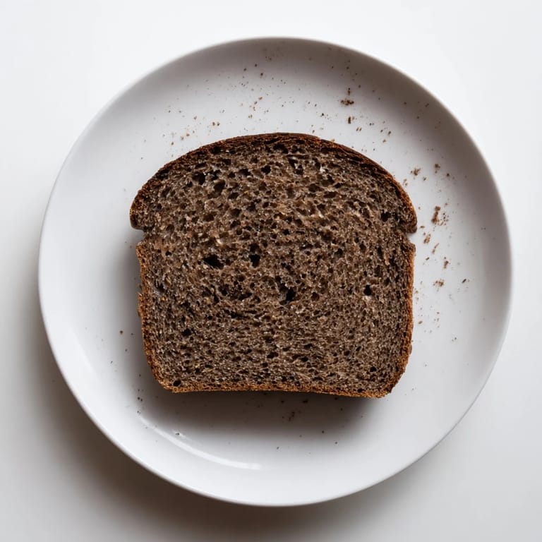 The beautiful dark interior of Estonian Leib sourdough, perfect for slicing and serving with butter.