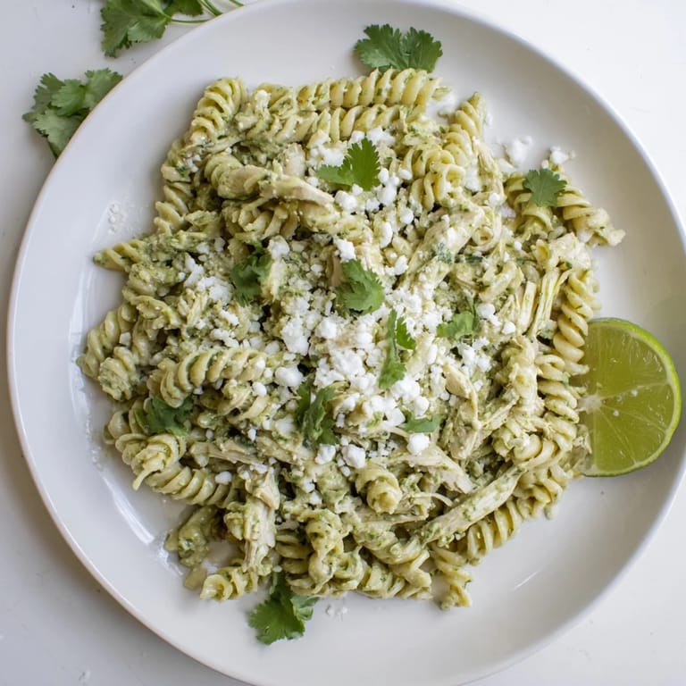 Fresh cilantro and lime garnish this creamy Cilantro Lime Chicken Pasta, perfect for a quick and healthy weeknight dinner.