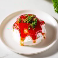 Cream Cheese and Pepper Jelly Star Appetizer, a vibrant star shape, ready to spread on crackers.